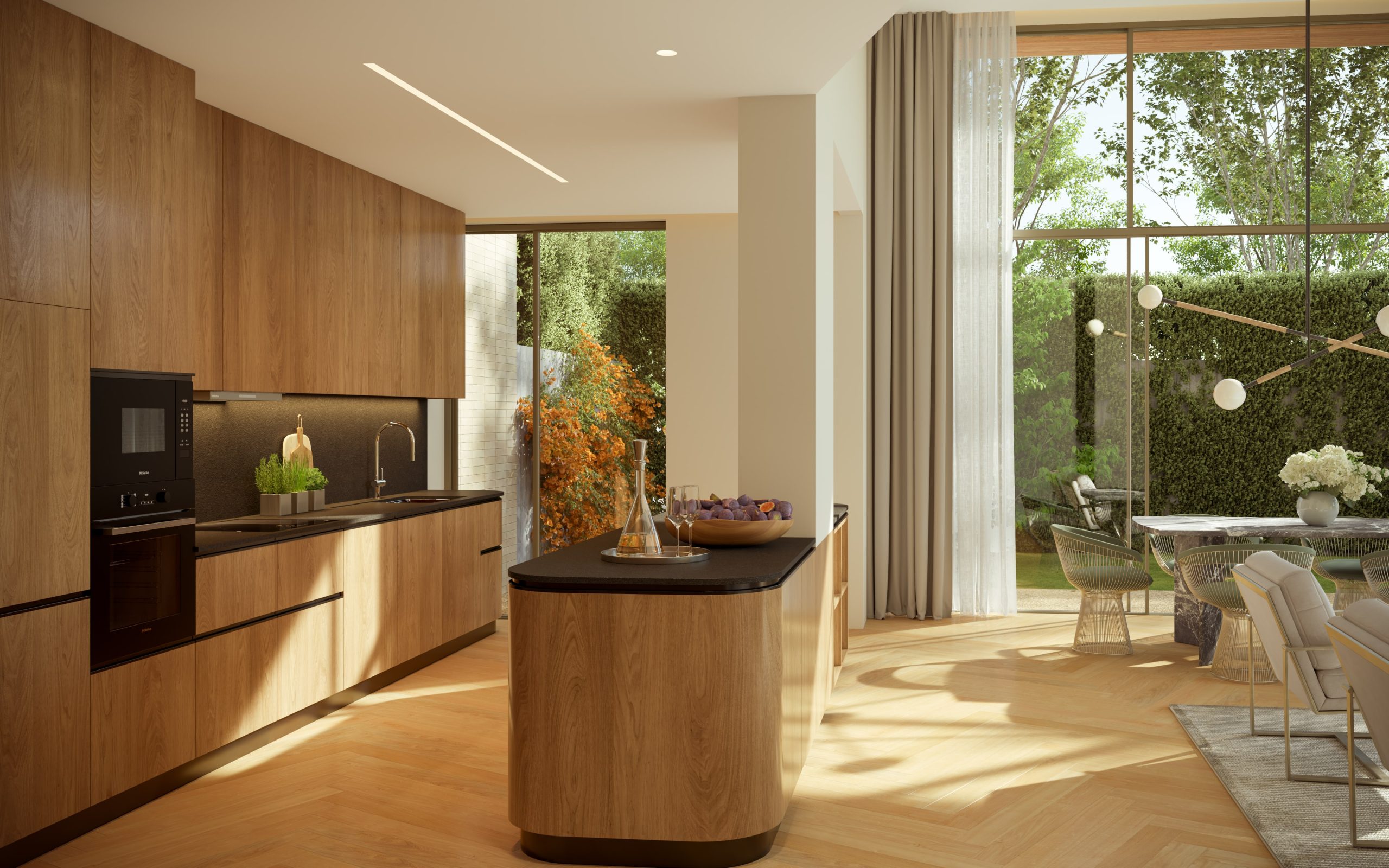 Cozinha equipada com acabamentos em madeira e mármore e sala de jantar iluminada por janelas amplas, num apartamento do empreendimento Foliage Foz do Douro.